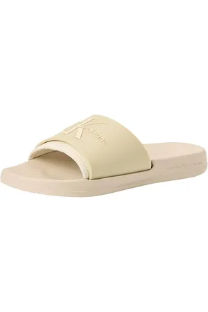 Calvin Klein Women Pool Slides Monogram TPU Sandals, Off-White (Eggshell/Creamy White), 40