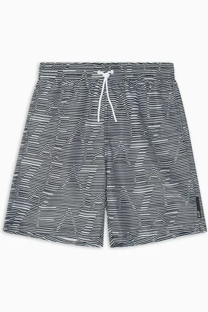 EA7 Logo Series boardshorts-style swim trunks with an all-over logo print