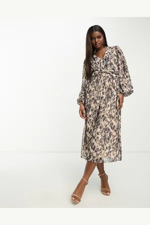 In The Style Chiffon twist detail midi dress with volume sleeves in leopard print