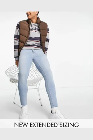 ASOS Spray on jeans in power stretch in mid wash with raw hem