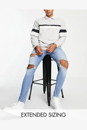 ASOS Spray on jeans in power stretch in mid wash with heavy rips