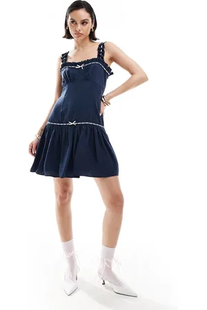 ASOS Ribbon frill strap mini dress with flippy hem in