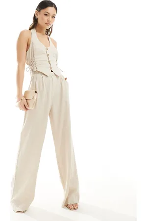 Rare Fashion London linen mix halterneck lace up side detail jumpsuit in beige