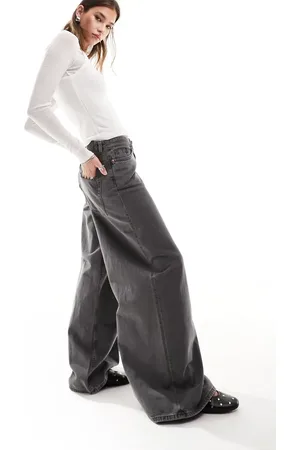 Monki Giga low waisted baggy wide fit jeans in dark wash