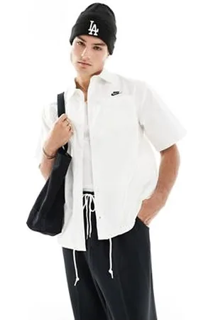 Nike Club woven short sleeve shirt in off white