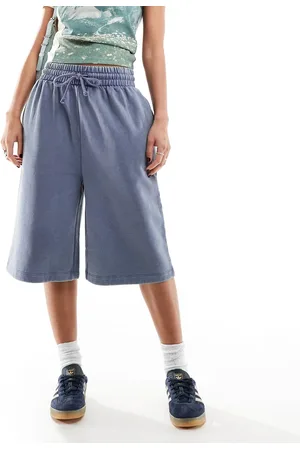 ASOS Heavyweight longline sweat shorts in washed indigo