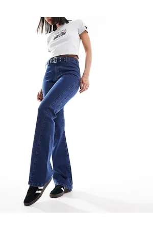 Urban Bliss Buckle detail low rise bootleg jeans in mid wash