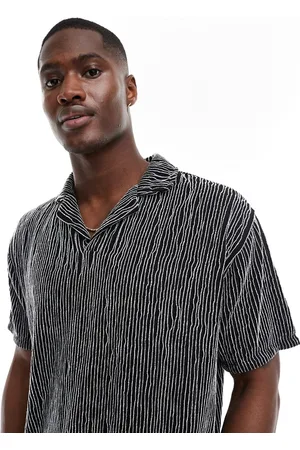 ASOS Relaxed revere polo in black textured stripe