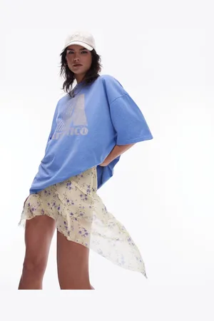 Topshop Sheer ditsy floral seamed asymmetric skirt in buttermilk