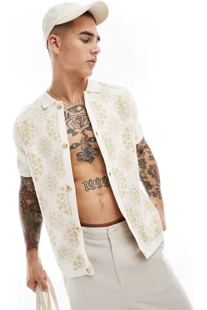 ASOS Relaxed knitted crochet button through polo in ecru and pink
