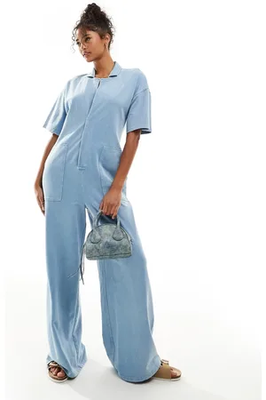 ASOS Boilersuit with wide leg & pockets in denim wash