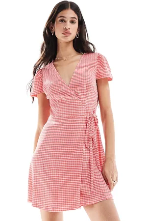Pieces® Wrap front mini dress in check