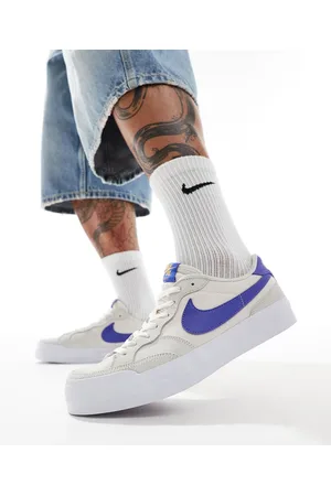 Nike Zoom Pogo Plus trainers in and navy