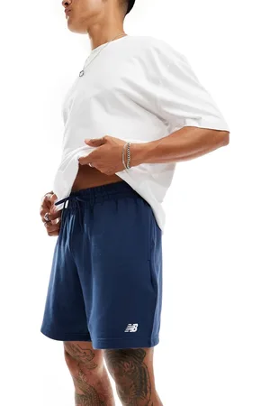 New Balance Sport essentials french terry short 7"" in