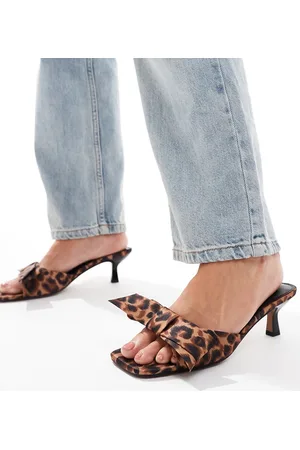 ASOS Hyphen bow detail mid heeled mules in leopard