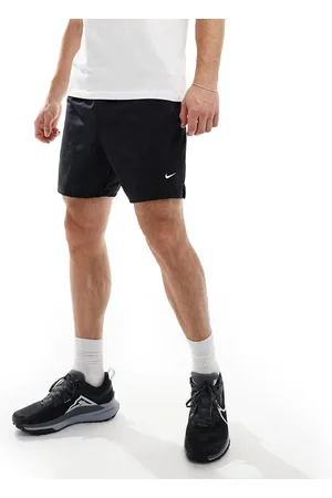 Nike Culture of Football checkerboard shorts in