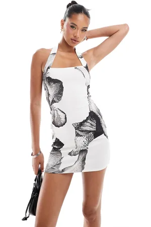 ASOS Scuba bodycon mini dress with halter strap in mono flower print