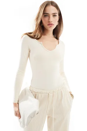 Threadbare Super stretch long sleeve bodysuit in ecru