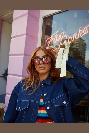 Labelrail X Laura Elizabeth Klein bow-detail oversized denim jacket co-ord in indigo