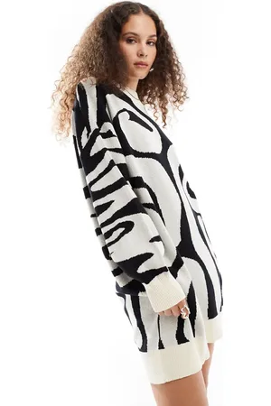 Monki Oversized knitted mini dress in mono swirl pattern jacquard