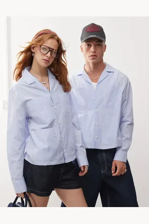 Reclaimed Unisex oversized boxy shirt with pocket detail in blue pinstripe