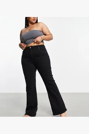 ASOS ASOS DESIGN Curve mid rise flare jeans in washed