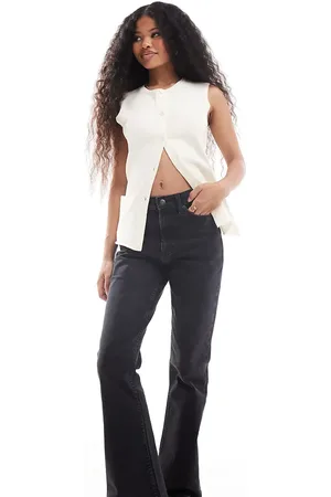 ASOS ASOS DESIGN Petite mid rise flare jeans in washed