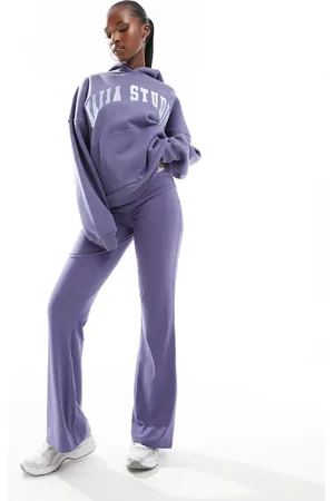 Kaiia Studio logo flared yoga pants co-ord in