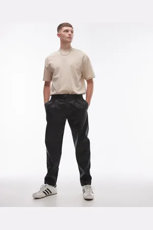 Topman Tapered faux leather trousers in