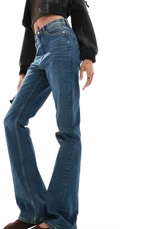 ASOS ASOS DESIGN Tall mid rise flare jeans in dark tinted