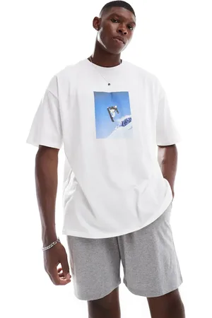 ASOS Pyjama set with snowboard graphics in white