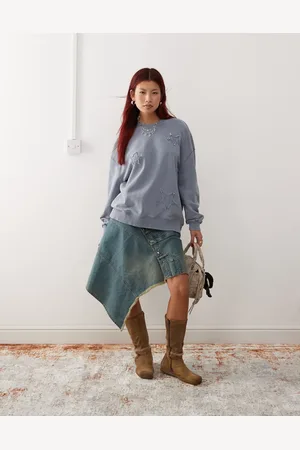 Monki Oversized sweatshirt with applique stars in washed blue