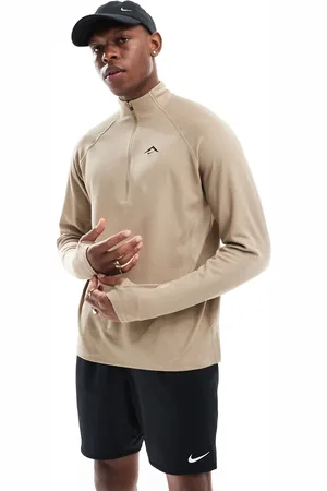 Nike Trail 1/4 zip sweatshirt in beige