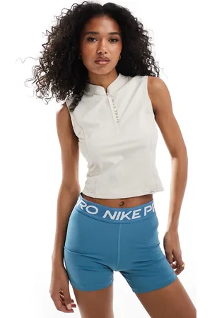 Nike Trail Dri-FIT 1/4 zip tank top in orewood beige