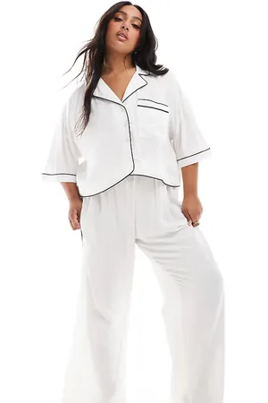 ASOS ASOS DESIGN Curve super soft slinky wide leg pyjama trouser in with contrast binding