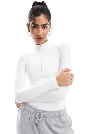 AGON Long sleeve zip up bodysuit in off