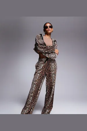 Juicy Couture Velour wide leg joggers exclusive to ASOS in leopard print