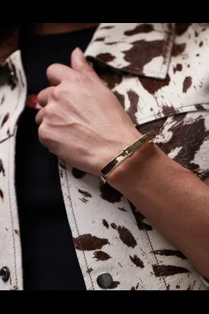 ARKET Plated cuff bracelet with bow detail