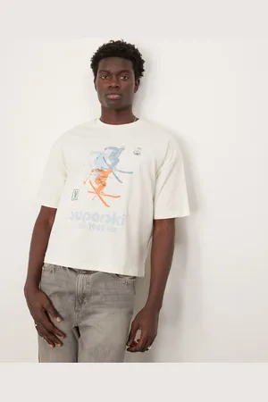 ASOS Boxy oversized t-shirt with ski sports graphic in cream