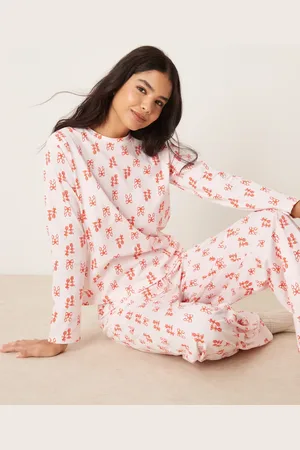 ASOS Long sleeve top & trouser pyjama set in and red bow print