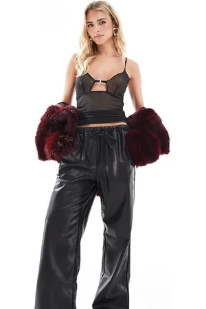 Bershka Petite faux leather tie waist wide leg trousers in