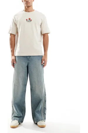 ASOS Super baggy with sporty detail in mid wash