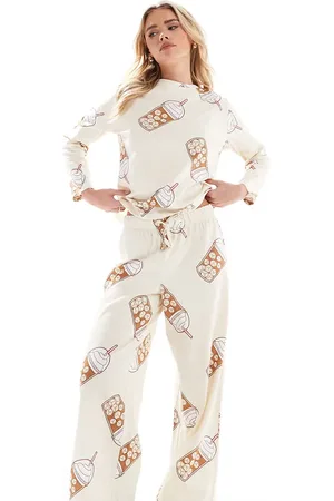 ASOS ASOS DESIGN Petite Iced coffee long sleeve top and trouser pyjama set in beige