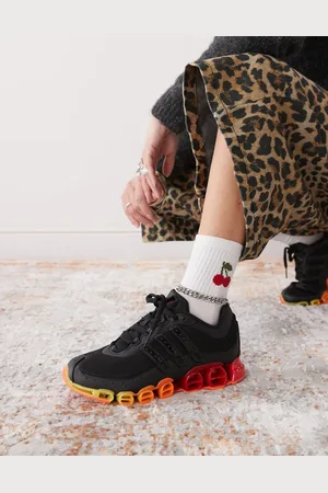 adidas Megaride trainers in and red