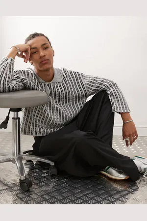Weekday Rene cable knit slouchy polo jumper in black and off