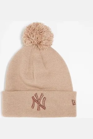 New Era NY Yankees metallic logo pom pom beanie in beige
