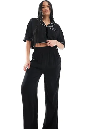 ASOS ASOS DESIGN Tall super soft slinky wide leg pyjama trouser in with contrast binding