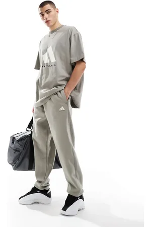 adidas Adidas Basketball unisex fleece joggers in beige