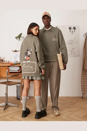 ASOS Disney unisex oversized polo sweatshirt with Mickey Mouse prints in khaki
