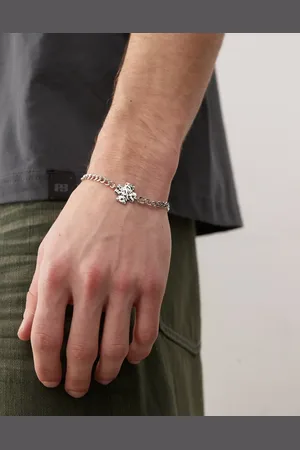 FADED FUTURE Bracelet with hammered cross pendant in